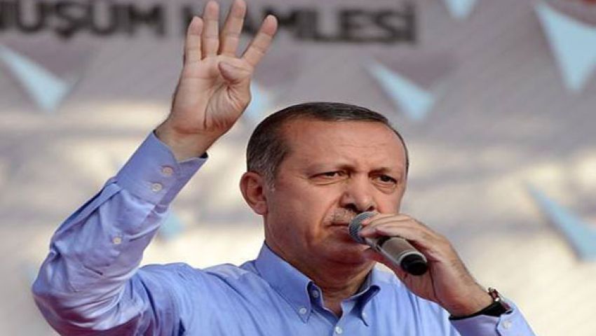 بالصور.. إشارة أردوغان تشعل الفيس بوك باللون الأصفر