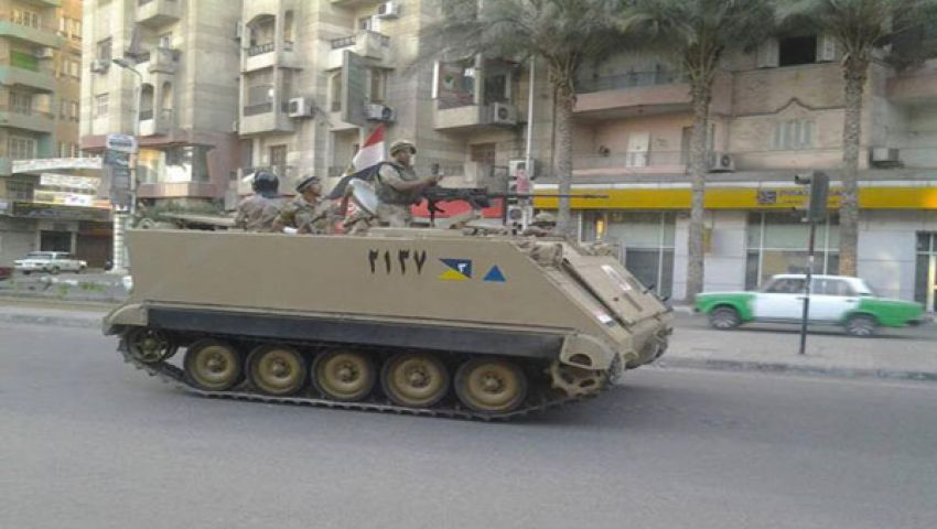 قوات الجيش تؤمن مبنى البحيرة المحترق‎